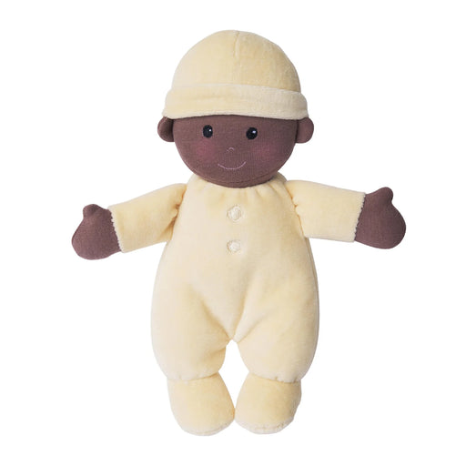 Plush baby doll with a yellow outfit and hat on a white background
