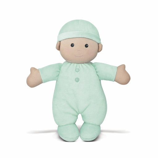 Light green plush baby doll with a hat on a white background