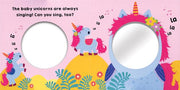 Interior spread of Baby Unicorns board book with playful unicorns, colorful scenery, and a circular mirror space for interactive reading