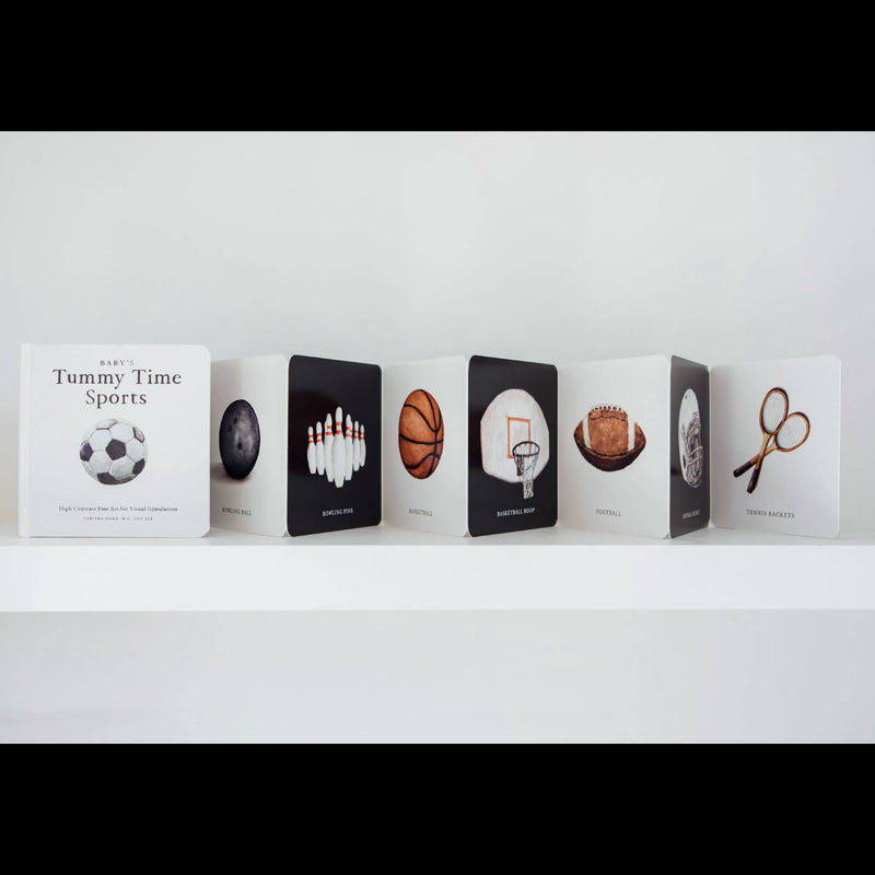 Row of books with sports-themed illustrations on a white shelf