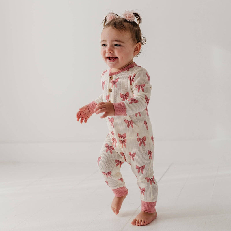 Toddler walking in the babysprouts Rose Elegance Bows waffle romper