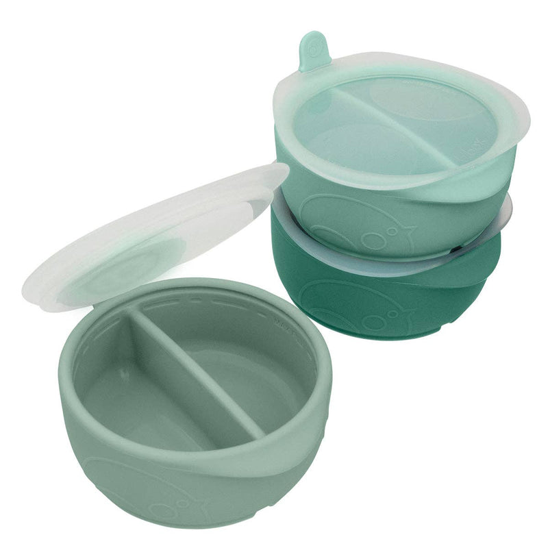 Green silicone food container with compartments and a lid on a white background