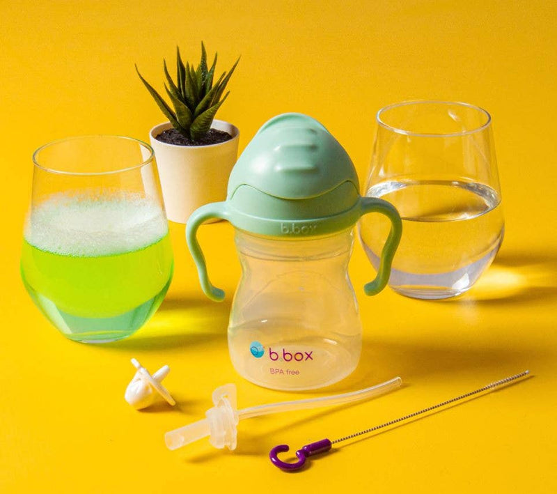 Bbox sippy cup with accessories on a yellow background