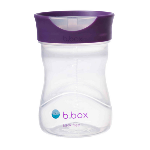 Clear sippy cup with purple lid on a white background