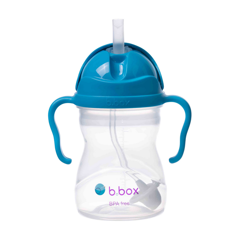 Blue sippy cup with clear body on a white background