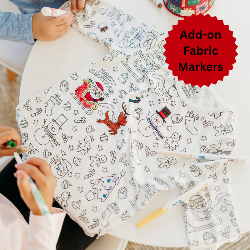 Children coloring Christmas colorable pajamas with fabric markers
