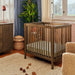 M29880NL,Babyletto,Pogo 8-in-1 Convertible Crib w/All-Stages Conversion Kits in Natural Walnut