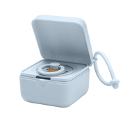 BIBS pacifier box in baby blue color shown open with a pacifier insert inside