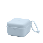 Closed BIBS pacifier box in baby blue color with attached strap on a white background