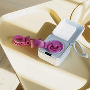 BIBS pacifier box in a table setting holding pacifiers for everyday use