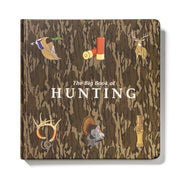 Book titled 'The Big Book of Hunting' with hunting-themed illustrations on a camouflage patterned cover.