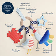 Close-up graphic highlighting textured fabrics, crinkle elements, teethers, and jingle features