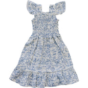Blue and white patterned dress on a white background