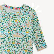 Close-up of Bunny Garden pajama top with magnetic neckline and botanical print