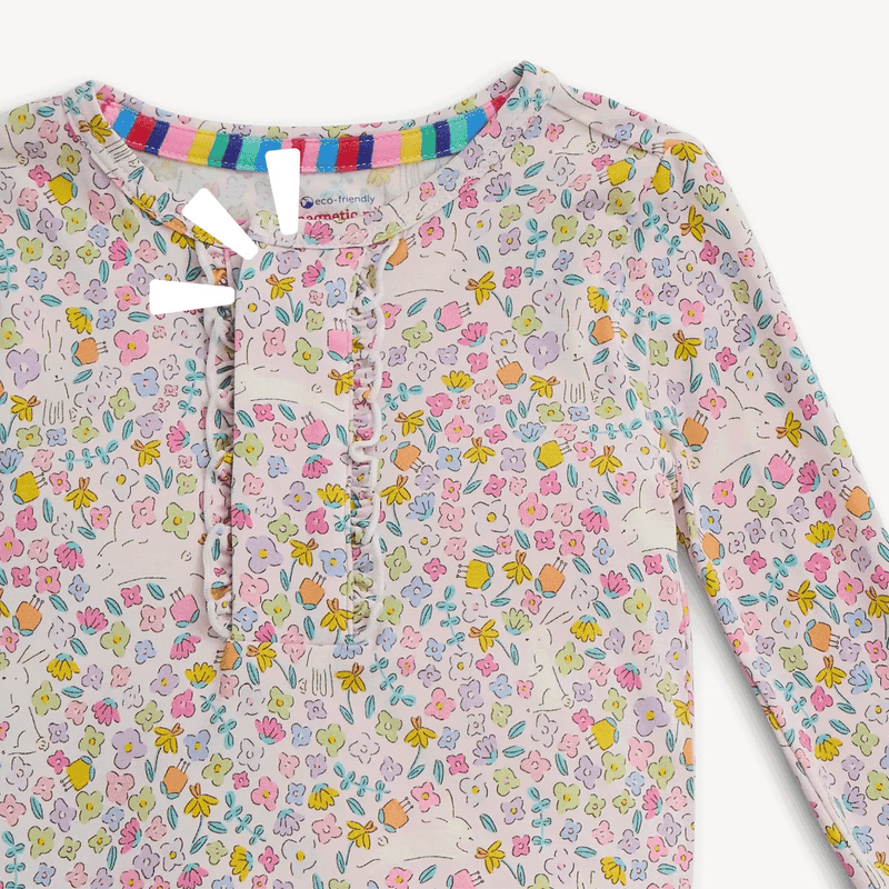 Close-up of Bunny Blossom pajama top showing ruffle trim and magnetic closure