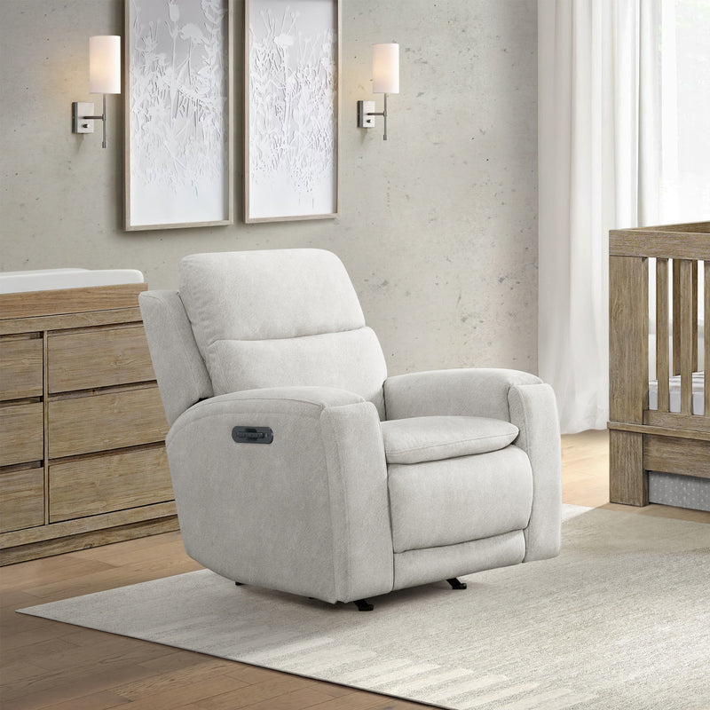 Gray recliner chair in a room with wooden furniture and light decor