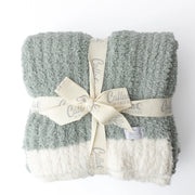 Sage Alani blanket set stacked and wrapped with a branded ribbon