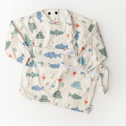 Baby romper with fish pattern on a white background
