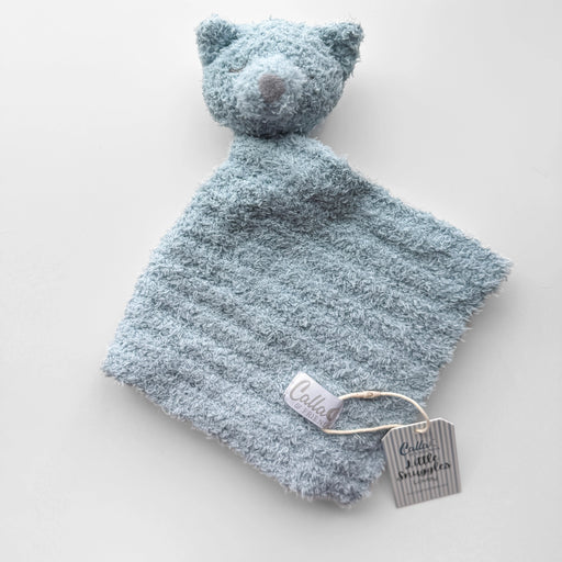 Blue textured security blanket with fox
ears and a tag on a white background