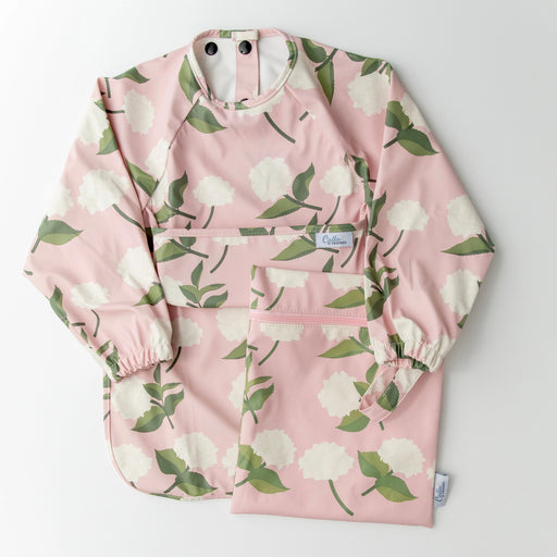 Floral-patterned apron on a light gray background