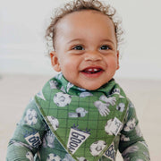 Smiling baby wearing the green soccer Copper Pearl All Star bandana bib