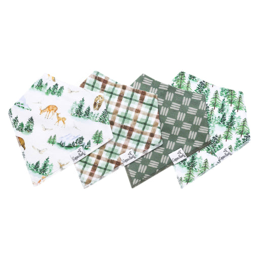 Four Grayson bandana bibs laid out: forest animals, brown plaid, green geo, and pine print