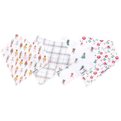 Four Juliet bandana bibs flat lay in nutcracker, plaid, petite floral, and scattered nutcracker prints