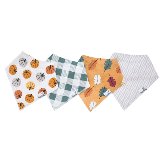 Four Karver bandana bibs flat lay with basketball, green gingham, autumn leaf, and gray chevron prints