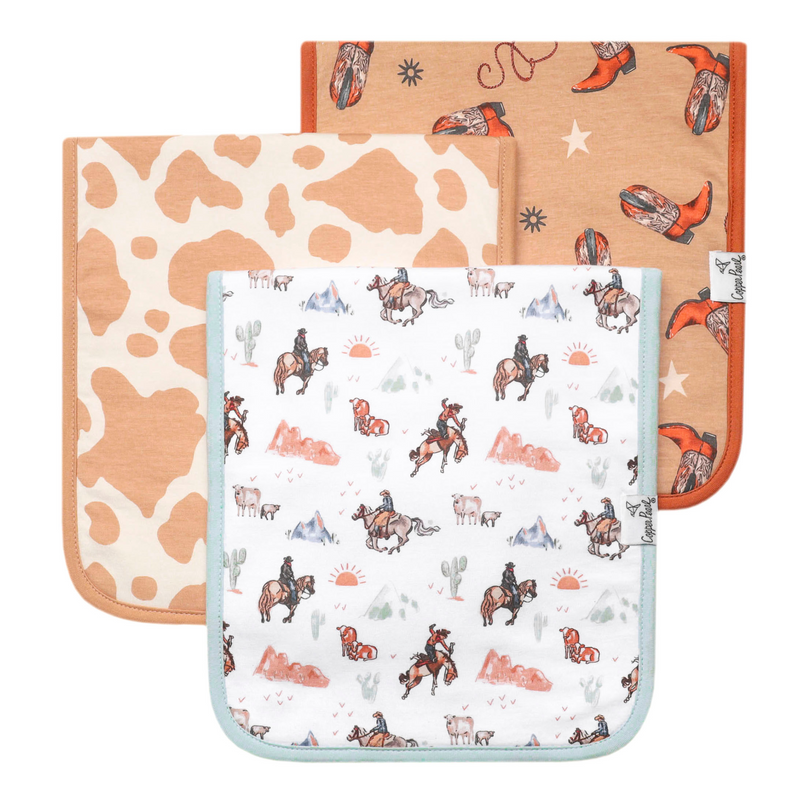 Copper Pearl Boone premium burp cloth set with tan cow print, cowboy print and orange western designs