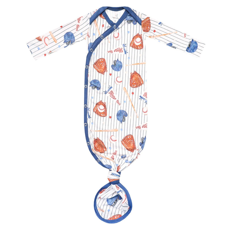 Copper Pearl newborn knotted gown in All Star print, baseball gloves and caps on pinstripes with navy trim, laid flat