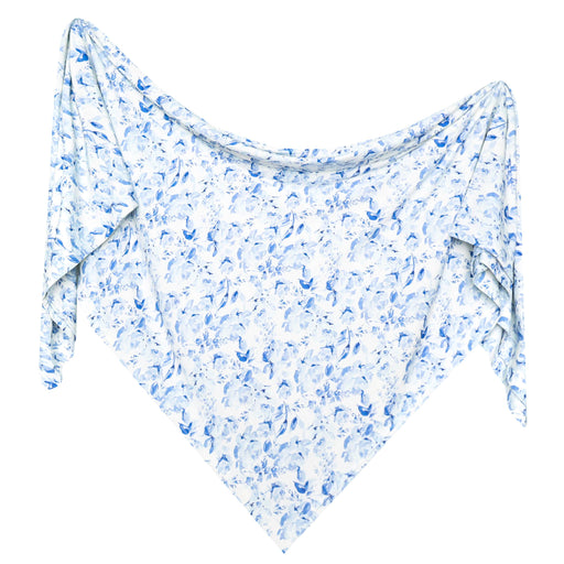 A lightweight baby swaddle blanketwith a delicate blue floral and leaf pattern on a white background, displayed against a solid white backdrop.