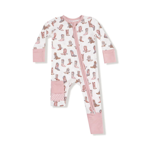 Flat lay of the romper with pink trim and cowgirl boot print.