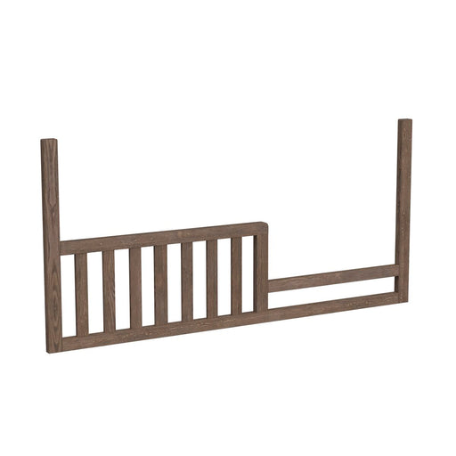Crib toddler rail