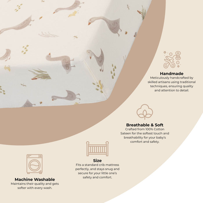 Detail graphic of Charlie crib sheet showing corner stretch and fabric features