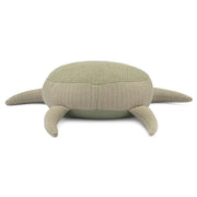 Turtle-shaped cushion with a textured surface on a white background