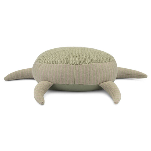 Turtle-shaped cushion with a textured surface on a white background