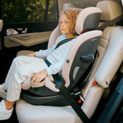 Child riding in the Cybex Callisto G 360 in belt-positioning booster mode