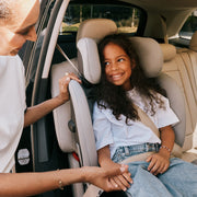 Girl climbing into the Cybex Callisto G 360 Select car seat
