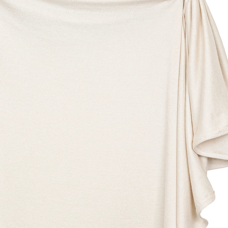 Close-up of the drape of the Lou Lou & Co Dakota cream plush knit swaddle blanket
