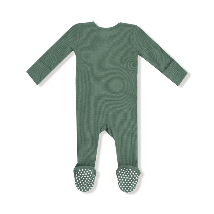 Back view of the same footie showing grippers on the soles.