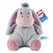 Plush toy resembling a donkey with pink ears and feet, featuring a GUND tag on a white background.
