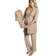 Woman wearing a beige robe and pants set on a white background