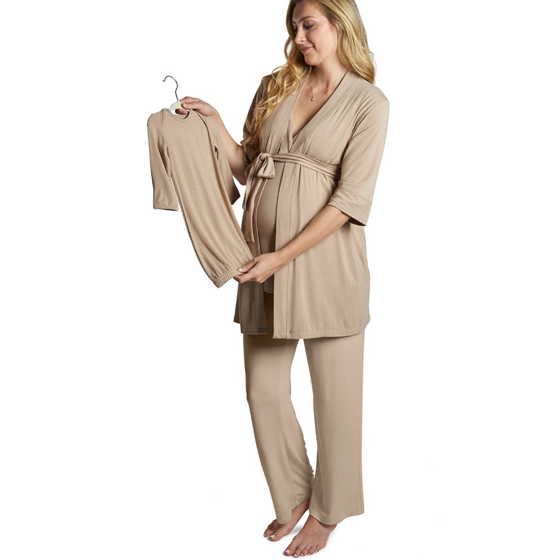 Woman wearing a beige robe and pants set on a white background