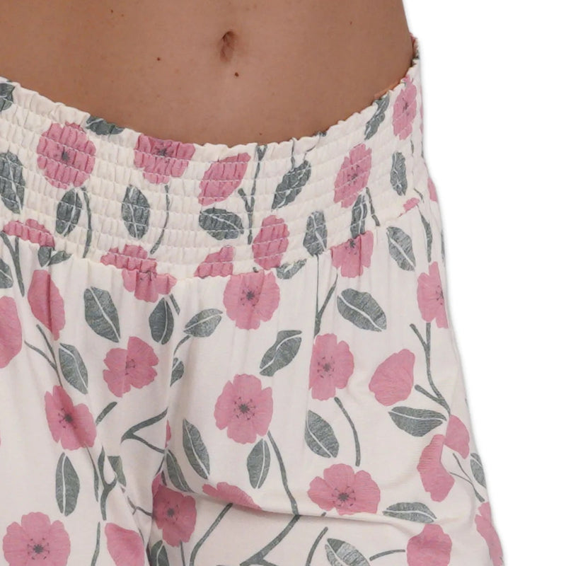 Floral patterned pants on a white background