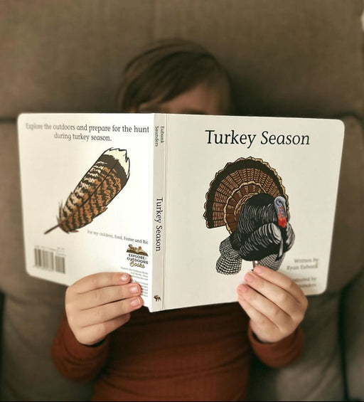 Child reading the Turkey Season board book