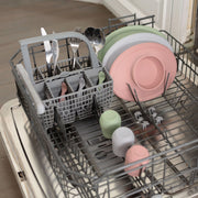 ezpz silicone spoons, cups and mats in the dishwasher, showing they are dishwasher safe