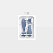 ezpz Tiny Spoon 2-pack silicone infant training spoons in Indigo, in package
