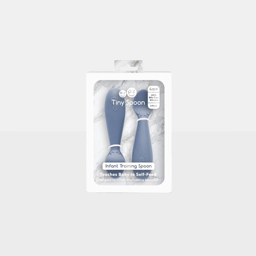 ezpz Tiny Spoon 2-pack silicone infant training spoons in Indigo, in package
