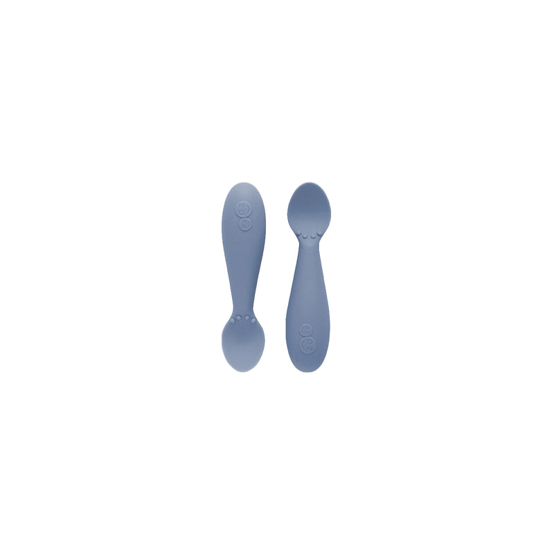 Two ezpz Tiny Spoon silicone infant spoons in Indigo
