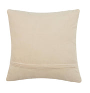 Beige pillow with a subtle texture on a white background